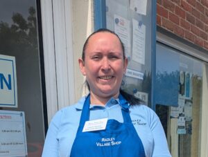 Photograph taken outside the shopof Relief Shop Manager, Leanne Timmins